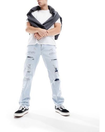 ASOS Jeans dritti lavaggio chiaro con strappi e dettagli riparati - Bianco