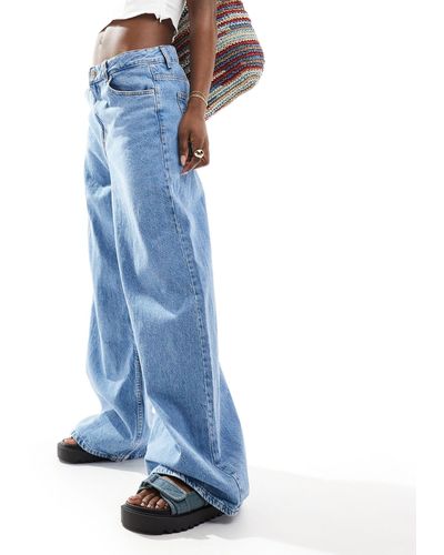 Bershka Jeans a fondo ampio chiaro - Blu