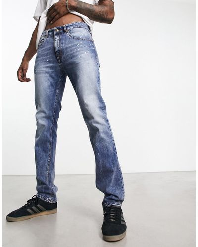 Versace Distressed Smalle Jeans - Blauw