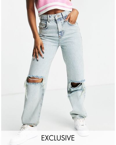 Reclaimed (vintage) Inspired - Jaren 90-stijl Dad Jeans Met Grote Scheuren En Antieke Wassing - Blauw