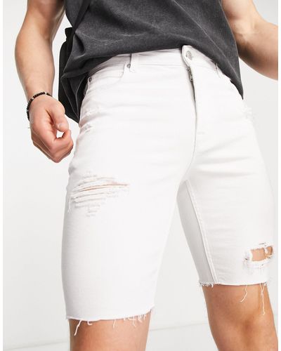 ASOS Pantalones cortos s elásticos con diseño rasgado - Blanco