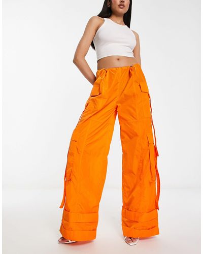 Annorlunda – oversize-fallschirmhose aus nylon - Orange