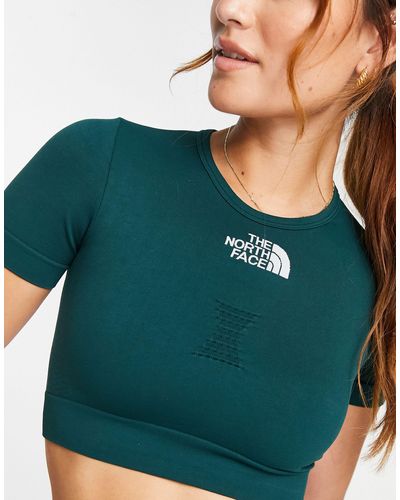 The North Face Training - Naadloze, Cropped Performance T-shirt - Groen
