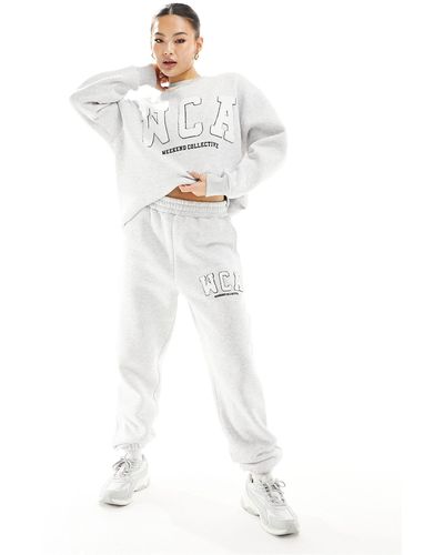 ASOS Asos Weekend Collective jogger With Varsity Logo - White