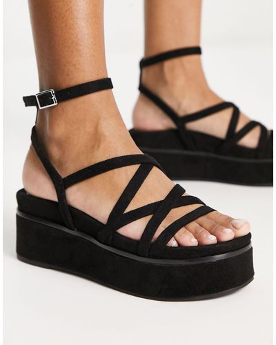 ASOS Taurus - sandali neri con fascette sottili e suola flatform - Nero