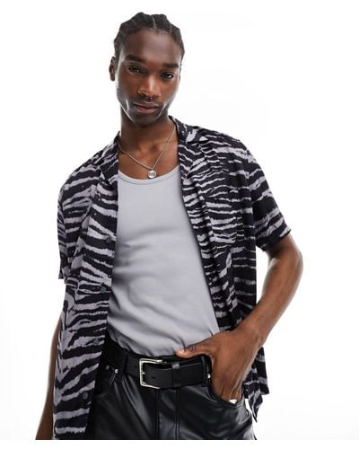 AllSaints Cubs - camicia a maniche corte con stampa zebrata - Nero