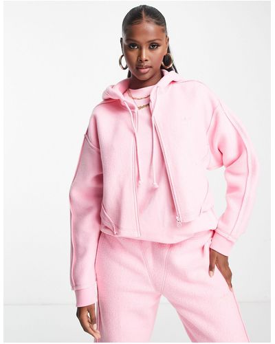 adidas Originals Sudadera rosa con capucha y cremallera luxe lounge