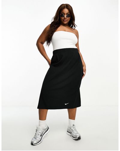 Nike Plus - Midi Rok Van Geribbelde Jersey - Zwart