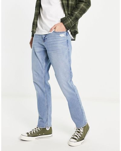 Hollister Vintage Slim-fit Jeans Met Distressing - Blauw