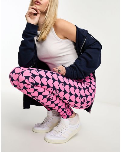Love Moschino – leggings mit durchgehendem herzmuster - Pink