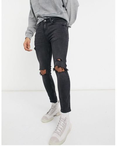 Pull&Bear Super Skinny Jeans Met Scheuren - Zwart