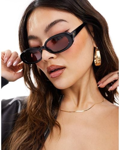 Le Specs X asos - outta love - occhiali da sole ovali neri con lenti rosa - Marrone