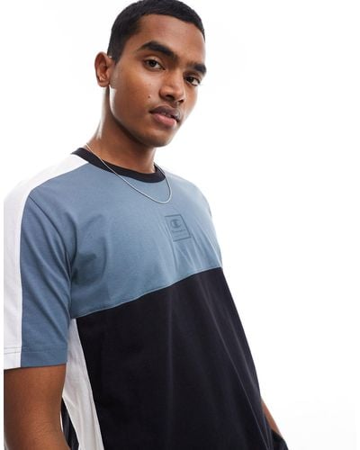 Champion Camiseta negra y gris con cuello redondo y diseño color block - Azul
