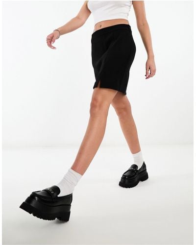 ONLY Mini-jupe ajustée à encoche sur le devant - Noir