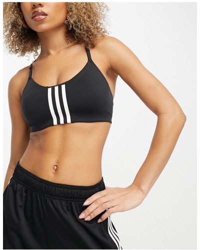 adidas Originals Adidas - training train icons - reggiseno sportivo a supporto leggero con 3 strisce - Nero