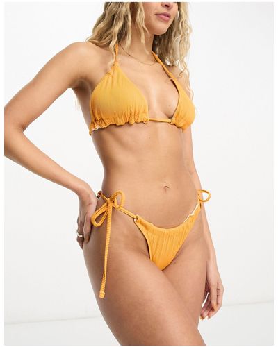 We Are We Wear Melissa - slip bikini double-face a coste con laccetti laterali - Arancione