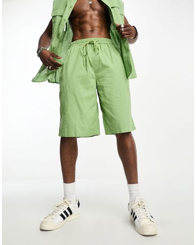 Collusion Pantalones cortos playeros verde claro