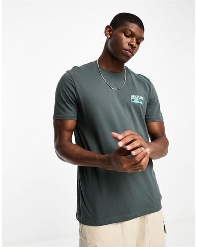 New Look – dunkeles t-shirt mit "new peaks"-aufdruck - Grün