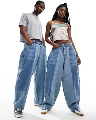 Collusion Unisex - jeans a palloncino lavaggio medio patchwork - Blu