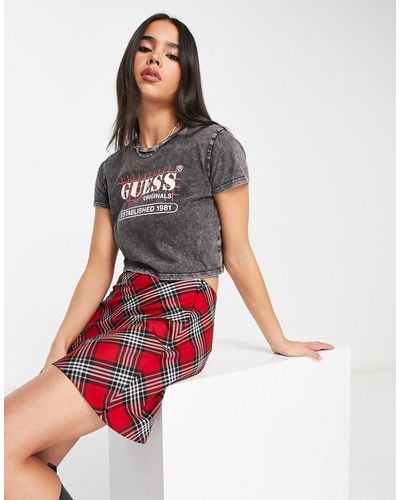 Camisetas y tops de manga corta Guess de mujer Rebajas en línea, hasta el 40 % de | Lyst