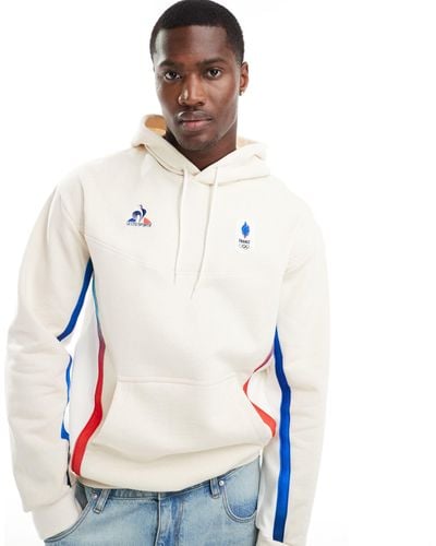 Le Coq Sportif Sudadera color con capucha y diseño del equipo francés para los juegos - Blanco