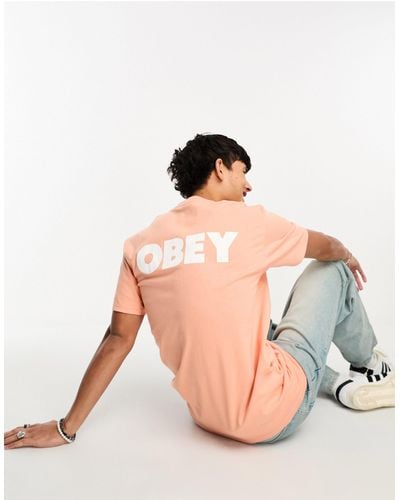 Obey T-shirt Met Opvallend Logo Op Achterkant - Oranje