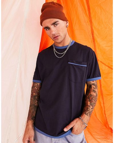 ASOS T-shirt comoda con tasca e profili a contrasto blu - Arancione