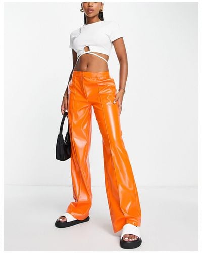 NA-KD X Melissa Bentsen Faux Leather Wide Leg Trousers - Orange