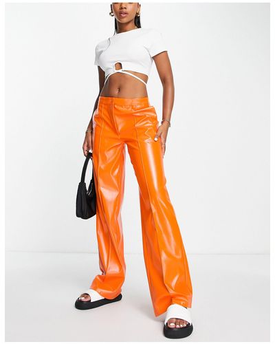 NA-KD X melissa bentsen - pantalon large en similicuir - Orange