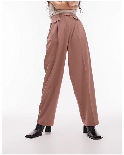 TOPSHOP Pantaloni extra larghi con pinces e patte con bottoni - Rosa