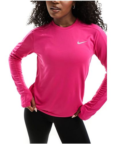 Nike Pacer dri-fit - top a maniche lunghe acceso - Rosa