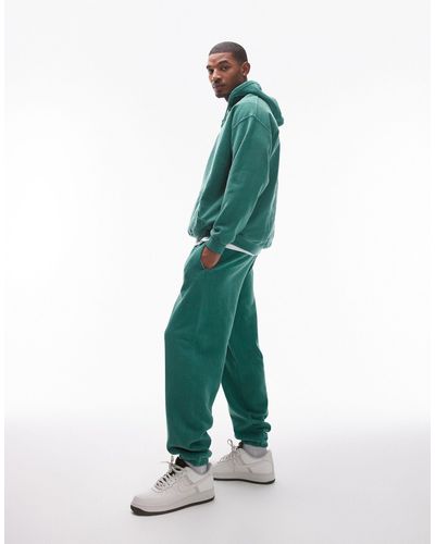 TOPMAN Joggers extragrandes con lavado envejecido - Verde