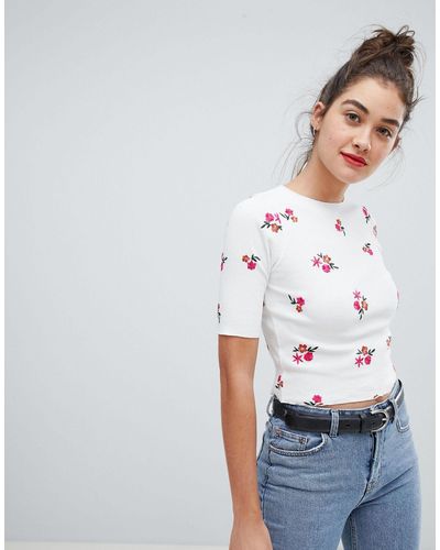 ASOS Ribbed Top With Ditsy Floral Embroidery And Lettuce Hem - White