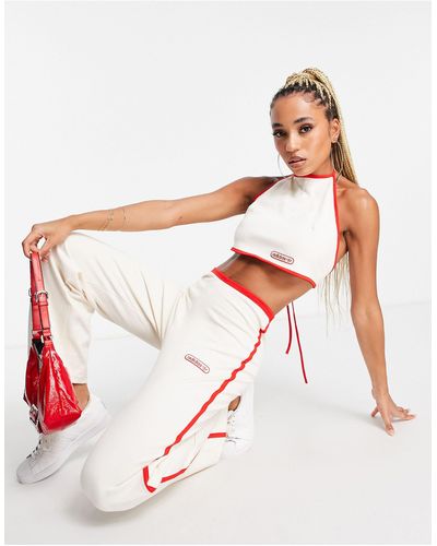 adidas Originals Resort - pantalon large avec liserés rouges - cassé - Blanc