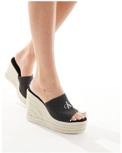 Calvin Klein – mehrfarbige sandalen zum hineinschlüpfen mit keilabsatz aus seilmaterial - Schwarz