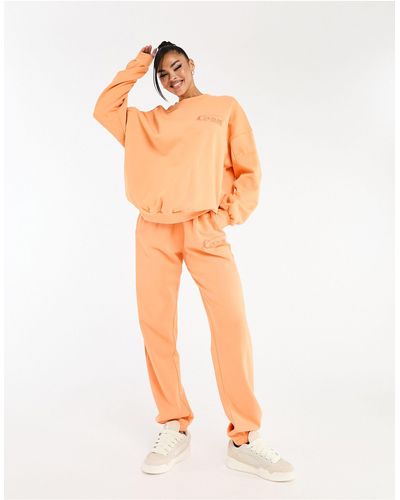The Couture Club Co-ord Oversized joggers - Orange