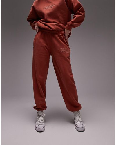 TOPSHOP Joggers s extragrandes con bajos ajustados, lavado vintage y bordado - Rojo