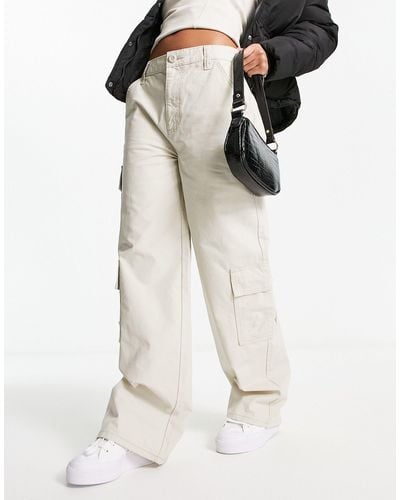 ASOS Pantalones cargo color extragrandes con varios bolsillos - Neutro