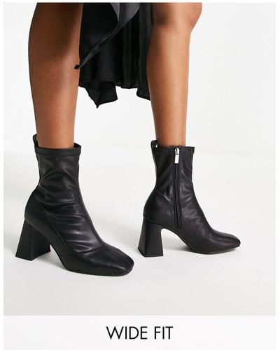 Schuh Bella - stivali a calza con tacco neri a pianta larga - Nero