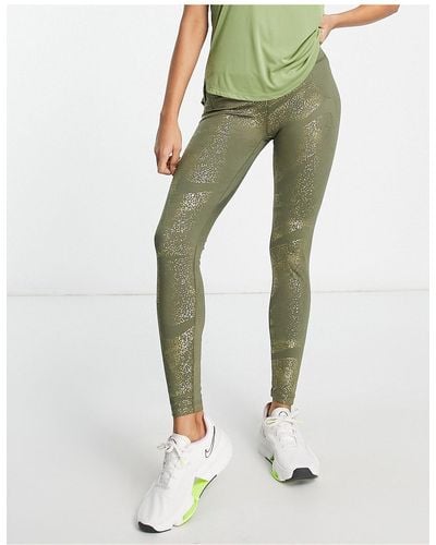 Nike One dri-fit - leggings a vita medio alta kaki con stampa glitterata - Bianco