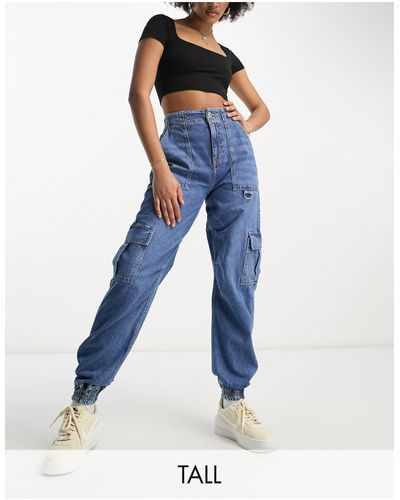 Jeans con strappo shop sui glutei