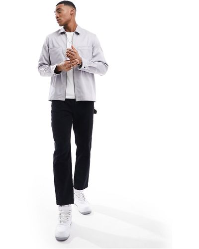 Calvin Klein Surchemise en coton avec poches en 3d - clair - Blanc