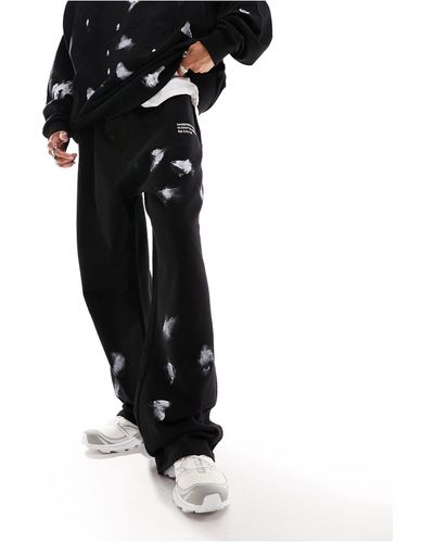 Collusion Relaxed Trackies With Hand Paint Spray - Black