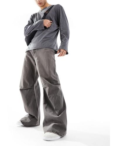 Weekday – sculpture – locker geschnittene baggy-jeans mit nahtdetail - Grau