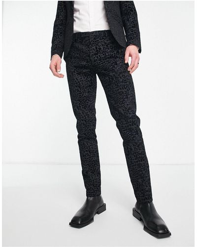 Twisted Tailor Helfand - pantaloni da abito skinny color antracite con motivo leopardato floccato - Nero