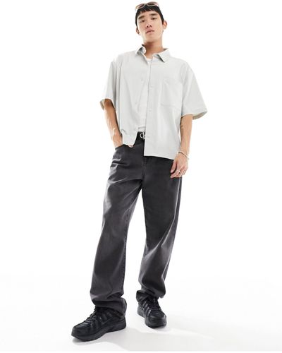 Calvin Klein Camicia a maniche corte grigia con etichetta cucita - Bianco