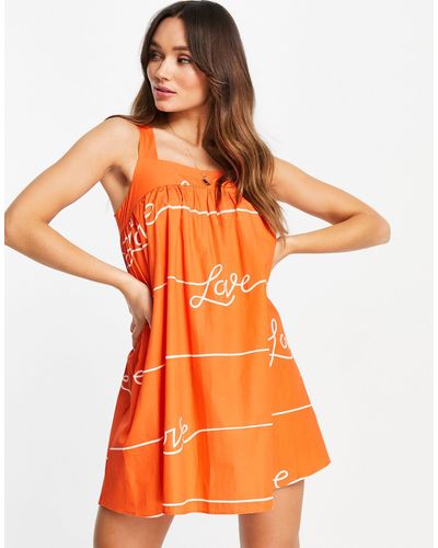Never Fully Dressed Mini Jurk Met 'love'-print - Oranje