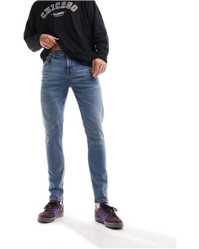 ASOS – eng geschnittene jeans - Schwarz
