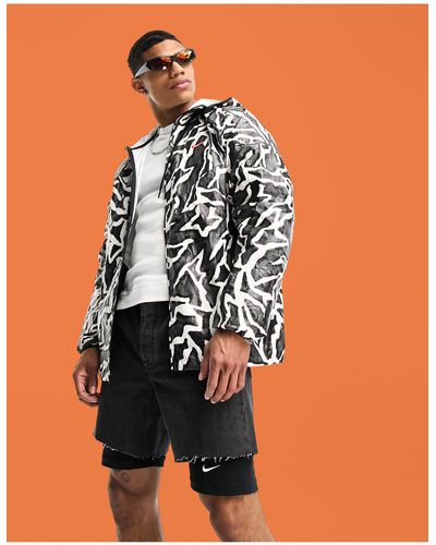 Nike Chaqueta negra estampada trend - Naranja