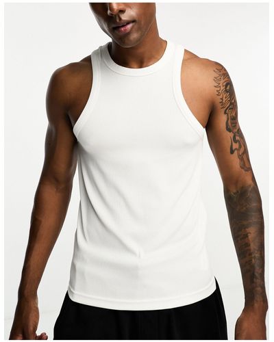 ASOS 4505 Camiseta deportiva blanca sin mangas - Blanco